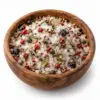 Zeezout Grigliata met grof zeezout, roze peper, jeneverbes, rozemarijn en laurier in een houten kom