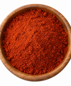 Jalapeño rood – gemalen chili in houten kom