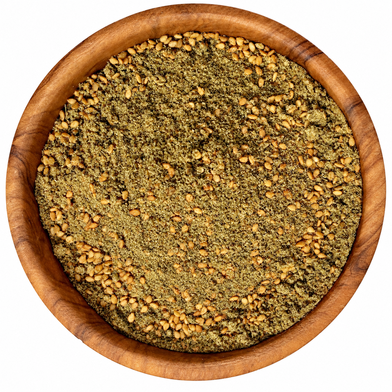 Zaatar rood - Kruidenkaravaan Zaatar rood in een ronde houten kom op een witte achtergrond.
